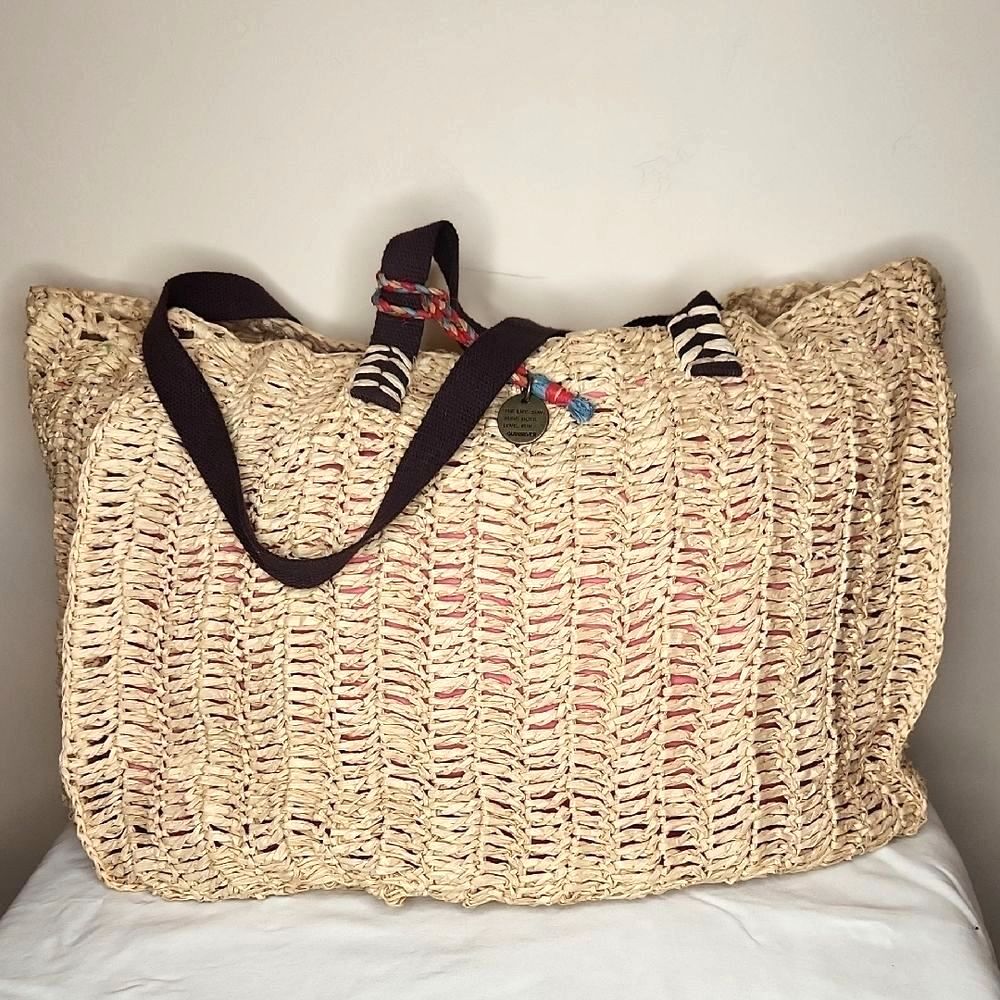 Quicksilver Woven Tan Tote with Pink Interior and Metal Charm